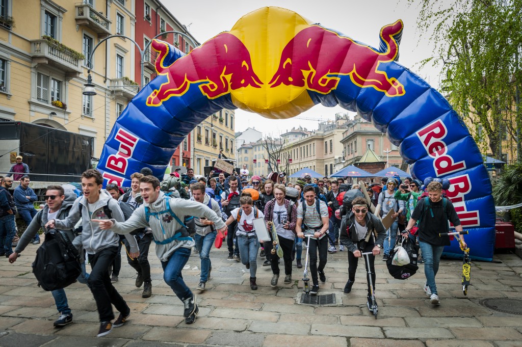 Event participants run at the starting line of Red Bull Can You Make It in Milan, Italy, on April 04 2014